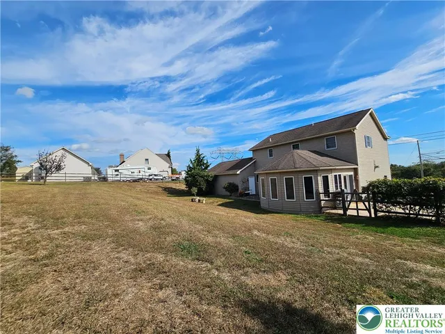 a view of an outdoor space and a yard