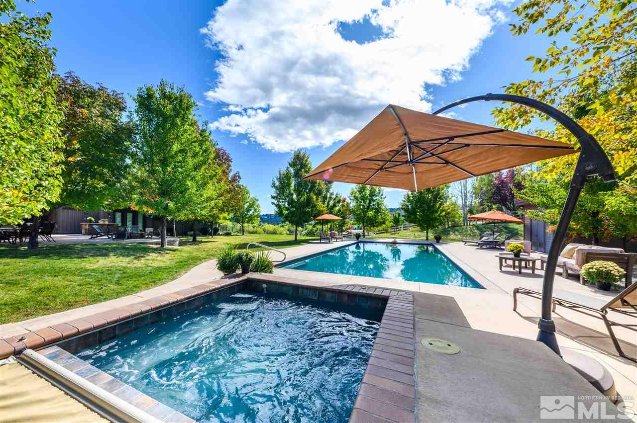 425 Juniper Hill Road Reno, NV 89519 - Photo 5 of 15 a view of a backyard with swimming pool