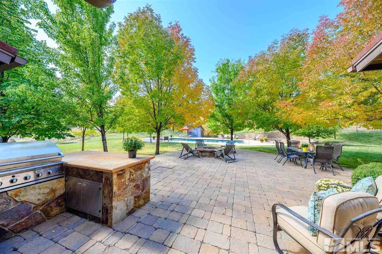 425 Juniper Hill Road Reno, NV 89519 - Photo 6 of 15 a view of a patio with table and chairs and couches