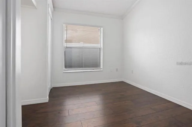 an empty room with a window