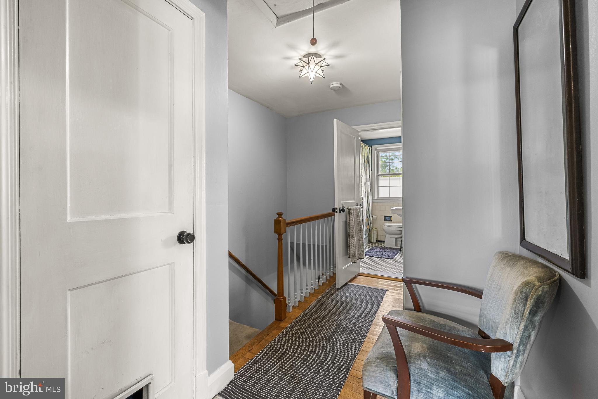 1620 Hardwick Road Towson, MD 21286 - Photo 16 of 38 a view of a hallway with wooden floor and staircase