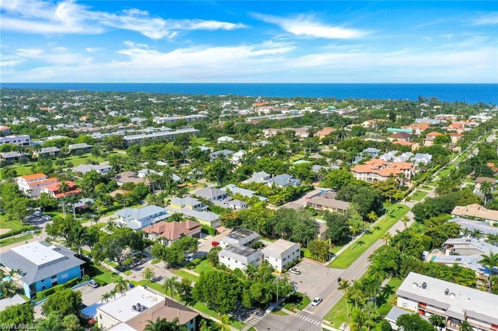 780 10th Avenue South, Unit 5 Naples, FL 34102 - Photo 22 of 27 an aerial view of residential houses with city view