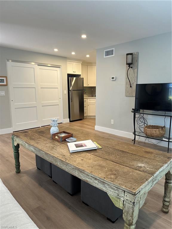 780 10th Avenue South, Unit 5 Naples, FL 34102 - Photo 9 of 27 a room with pool table and flat screen tv