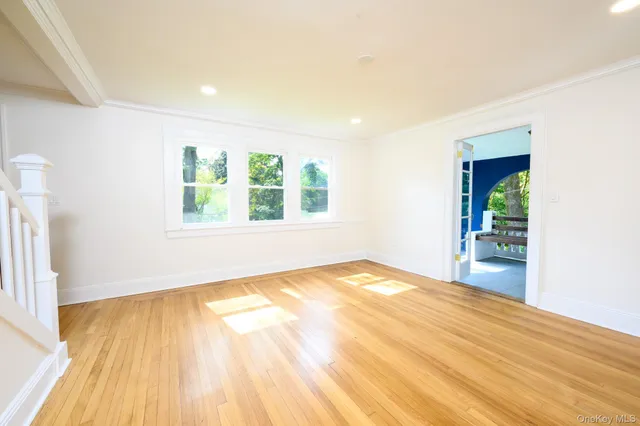 a view of an empty room and window