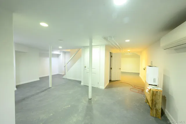 an empty room with a bathroom