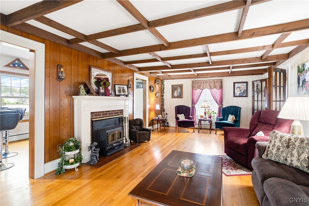 114 Seneca Avenue Oneida, NY 13421 - Photo 6 of 26 Large living w/ woodburning fireplace