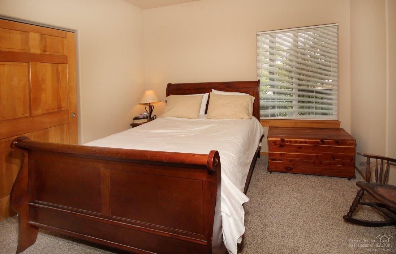 64624 Deschutes Market Road Bend, OR 97701 - Photo 13 of 25 2nd bedroom on the main level.