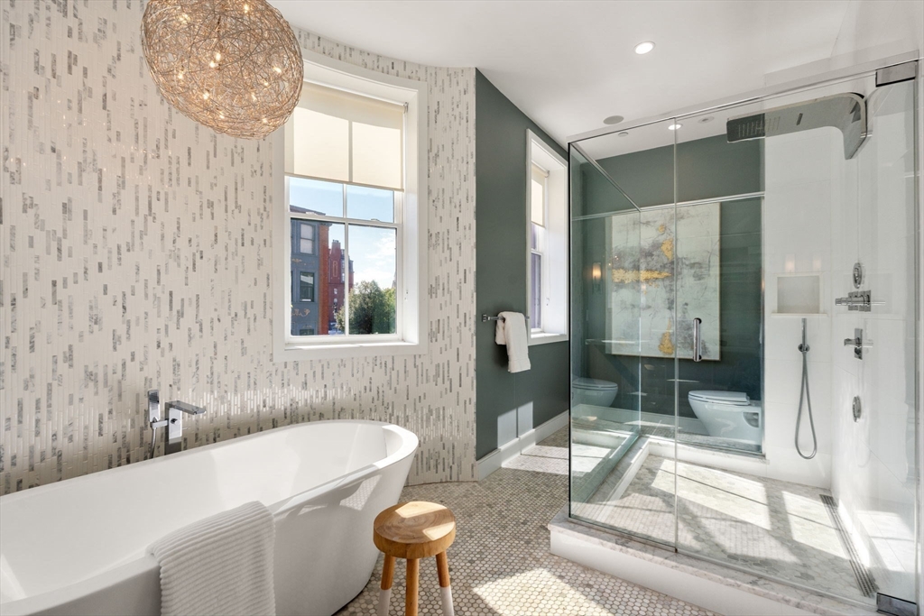 35 Hanson Street, Unit 2 Boston, MA 02118 - Photo 11 of 23 a bathroom with a bathtub and a sink