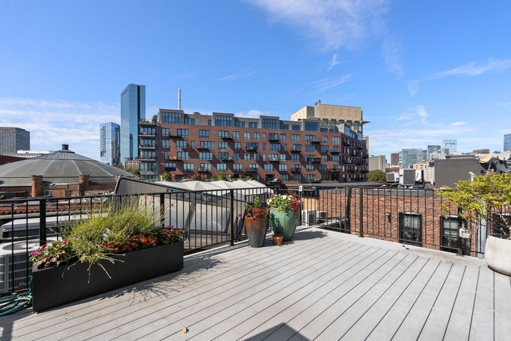 35 Hanson Street, Unit 2 Boston, MA 02118 - Photo 19 of 23 a view of a balcony with wooden floor