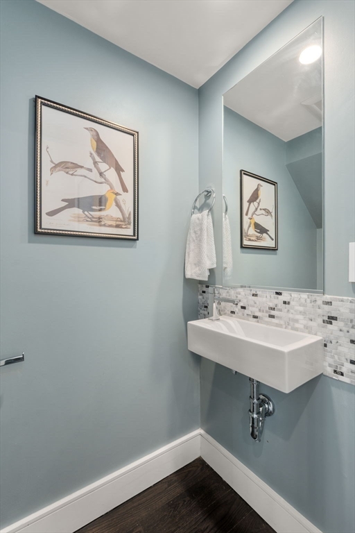 35 Hanson Street, Unit 2 Boston, MA 02118 - Photo 5 of 23 a view of a hallway with paintings on the wall