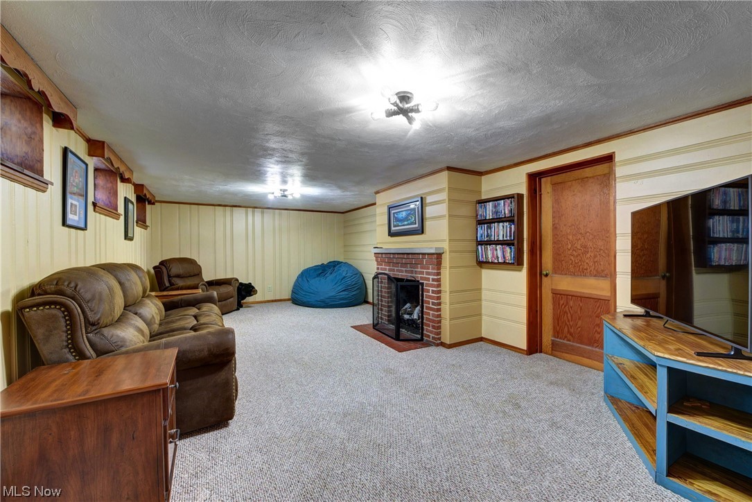 19646 Henry Road Fairview Park, OH 44126 - Photo 24 of 35 Rec room with gas fireplace