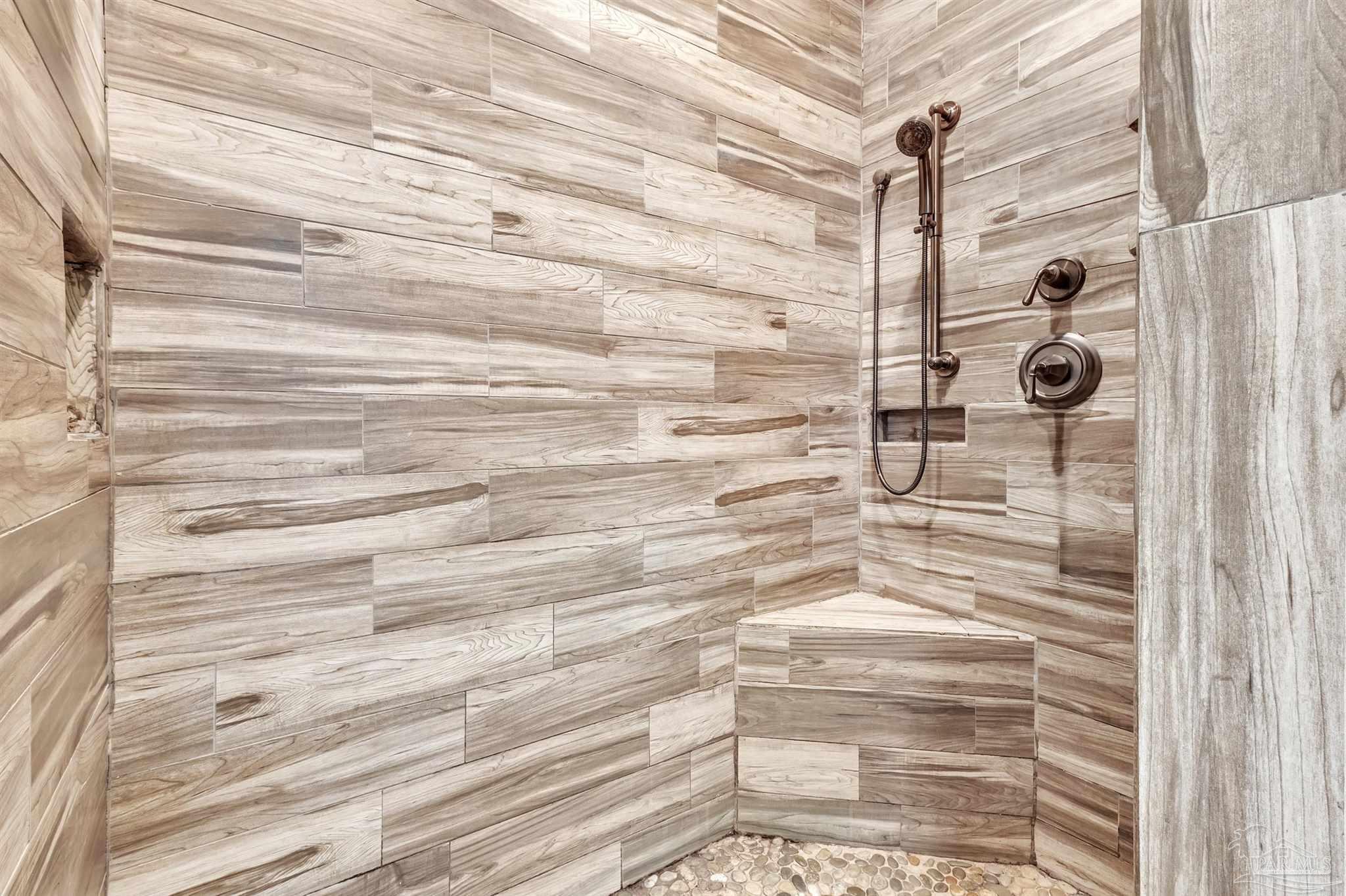 5406 Steele Road Baker, FL 32531 - Photo 24 of 46 a bathroom with a shower