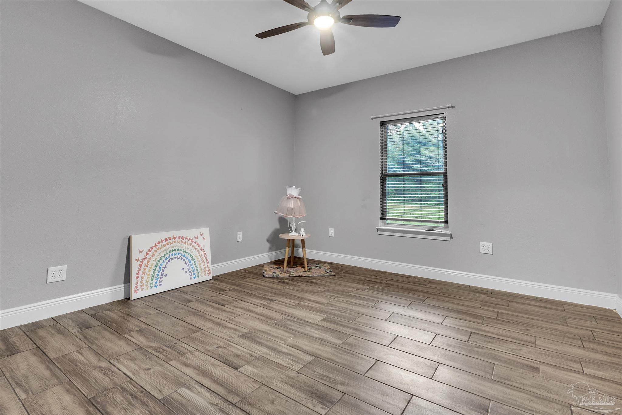 5406 Steele Road Baker, FL 32531 - Photo 26 of 46 a view of a livingroom with a window