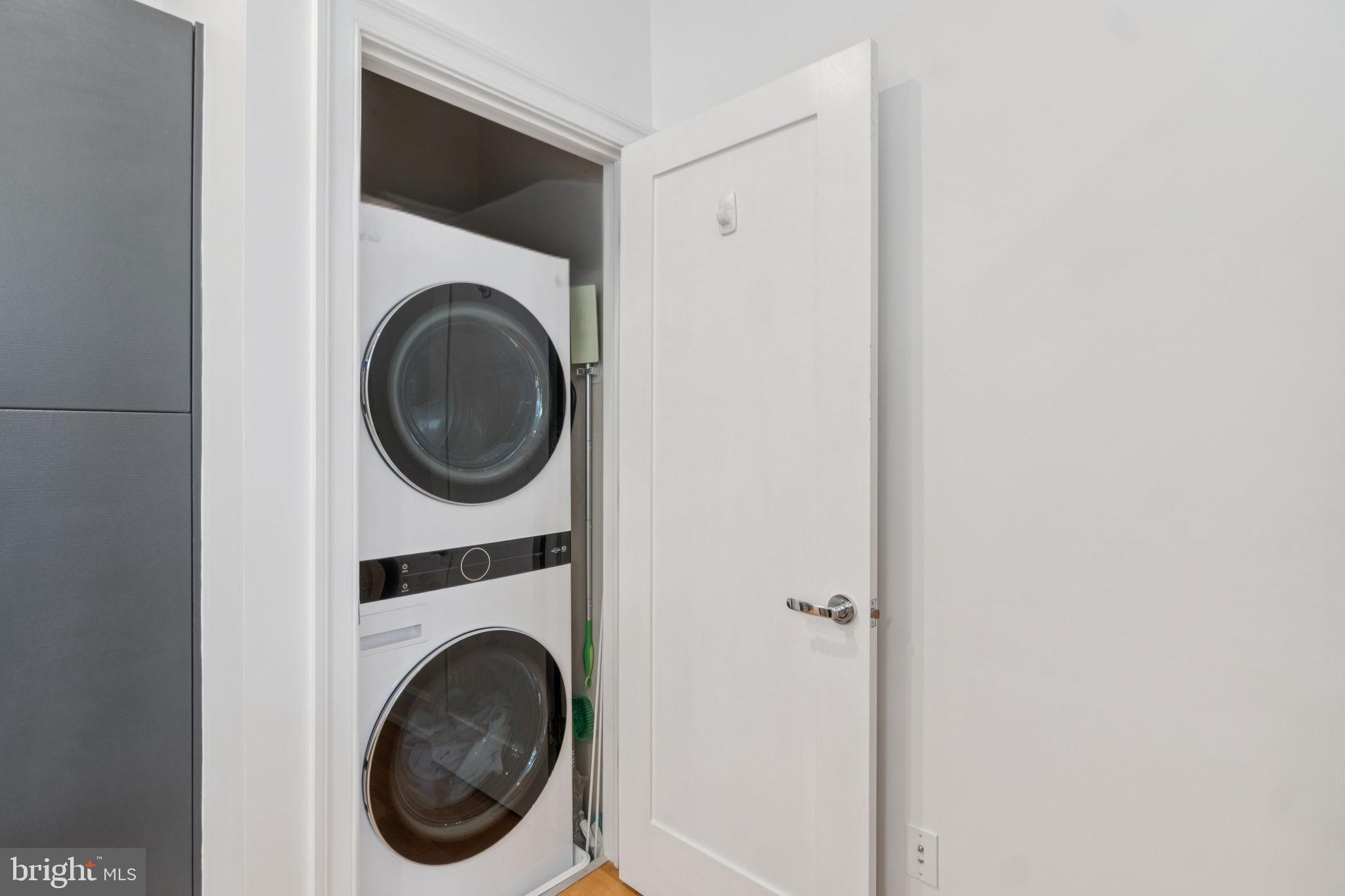 2516 Q Street Northwest, Unit Q206 Washington, DC 20007 - Photo 13 of 16 a utility room with dryer and washer