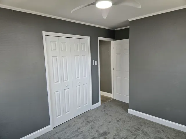 an empty room with a hallway