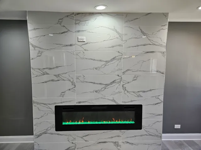 a room with a fireplace and a walk in closet