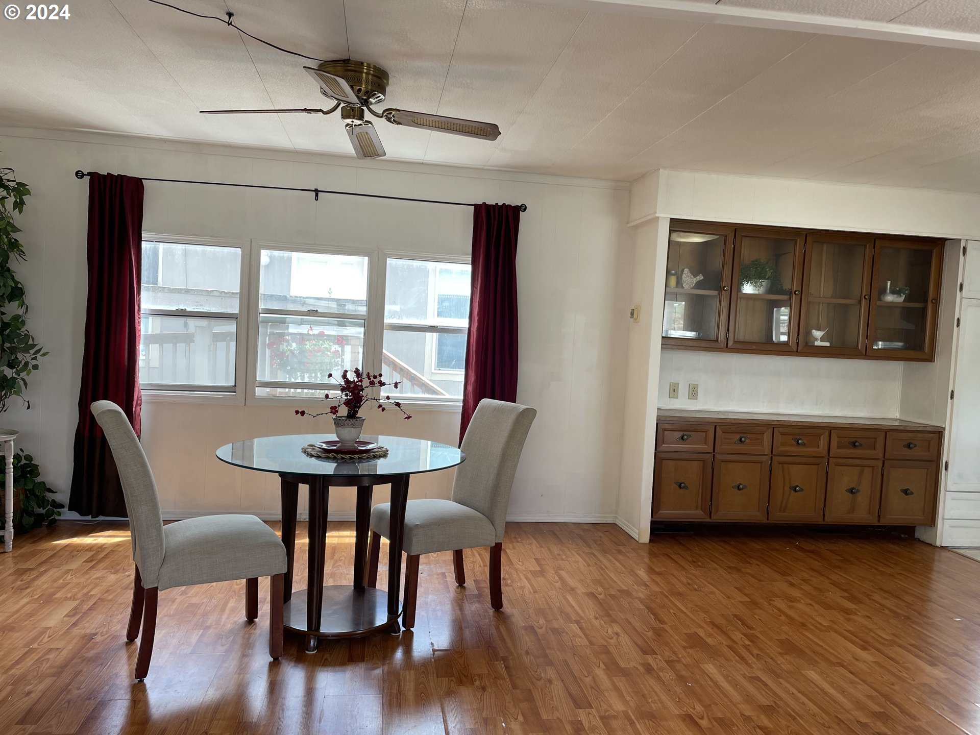 2150 Laura Street, Unit 99 Springfield, OR 97477 - Photo 8 of 24 a dining room with furniture and window