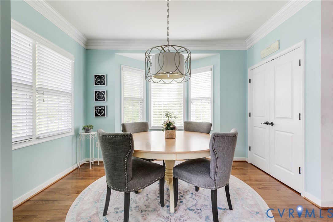 3900 Redbud Road Glen Allen, VA 23060 - Photo 16 of 37 a view of a dining room with furniture window and wooden floor