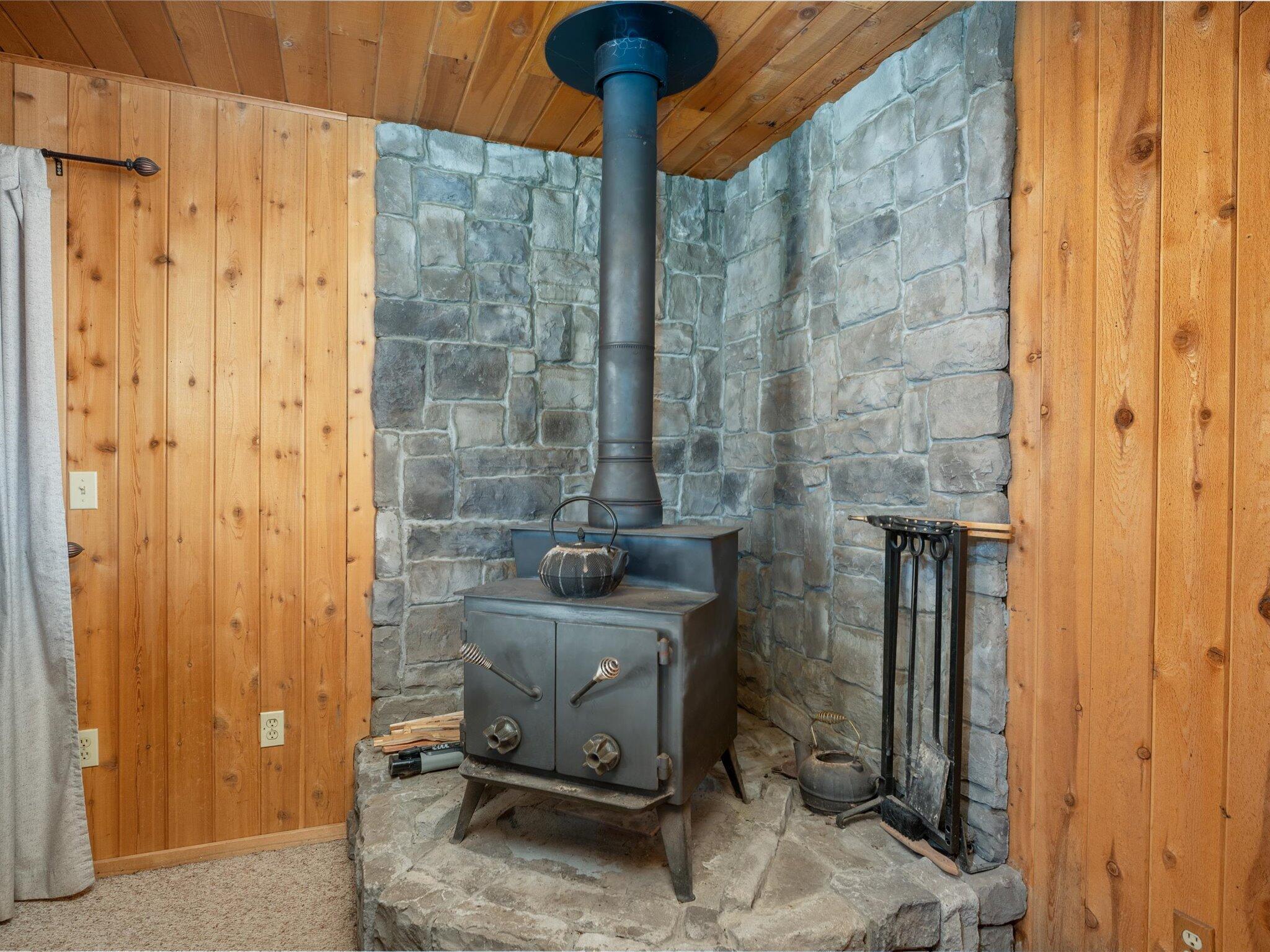8435 Starlite Pines Road Shingletown, CA 96088 - Photo 8 of 53 08-8435 Starlight Pines - Interior Stove