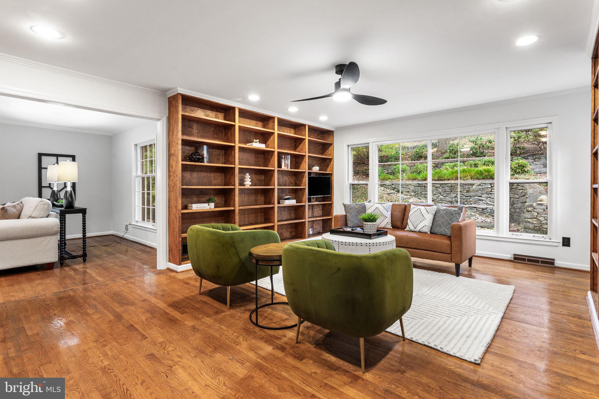 7404 Rippon Road Alexandria, VA 22307 - Photo 12 of 28 a living room with furniture and a large window