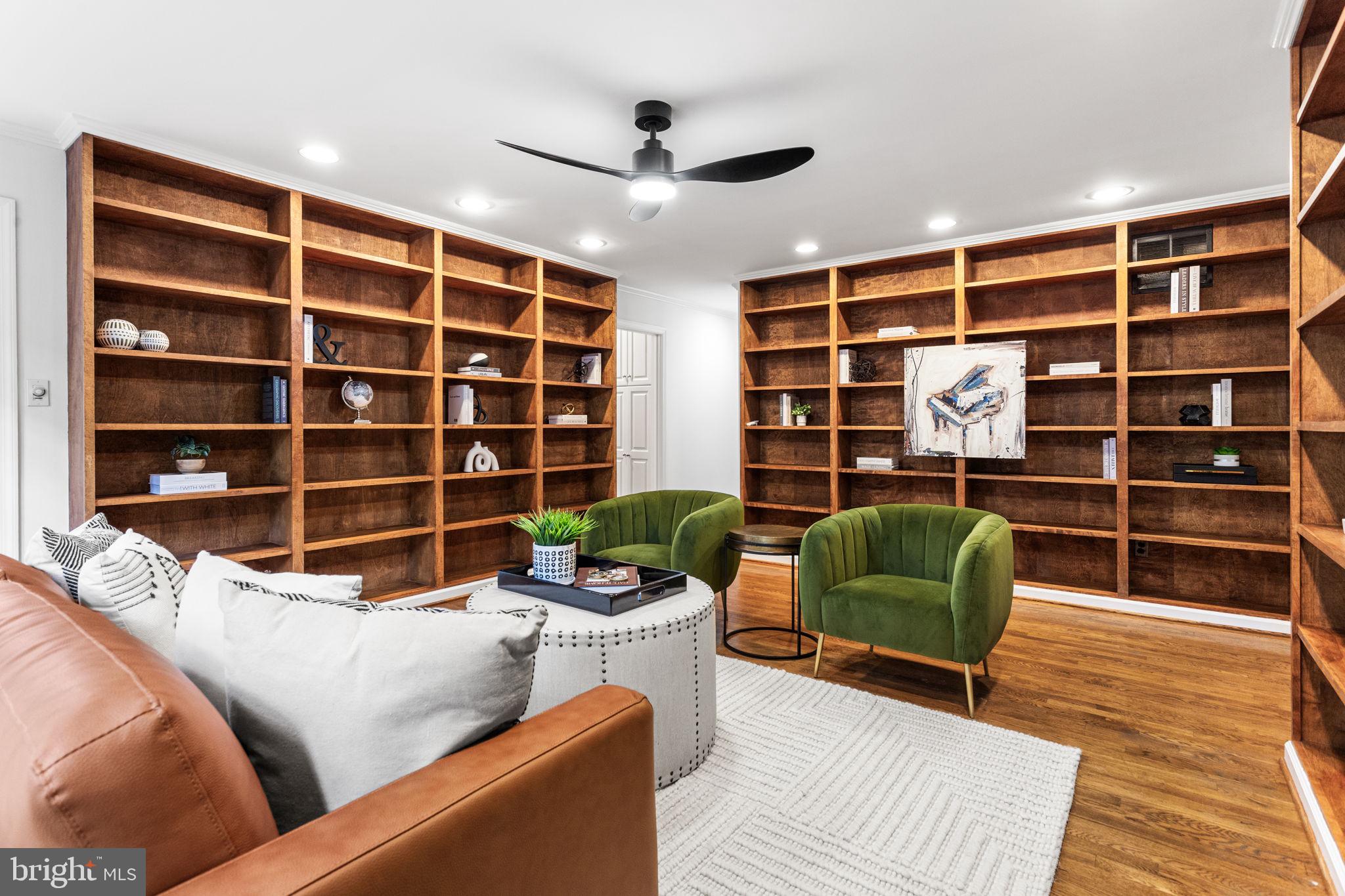 7404 Rippon Road Alexandria, VA 22307 - Photo 13 of 28 a view of a livingroom with furniture and a bookshelf