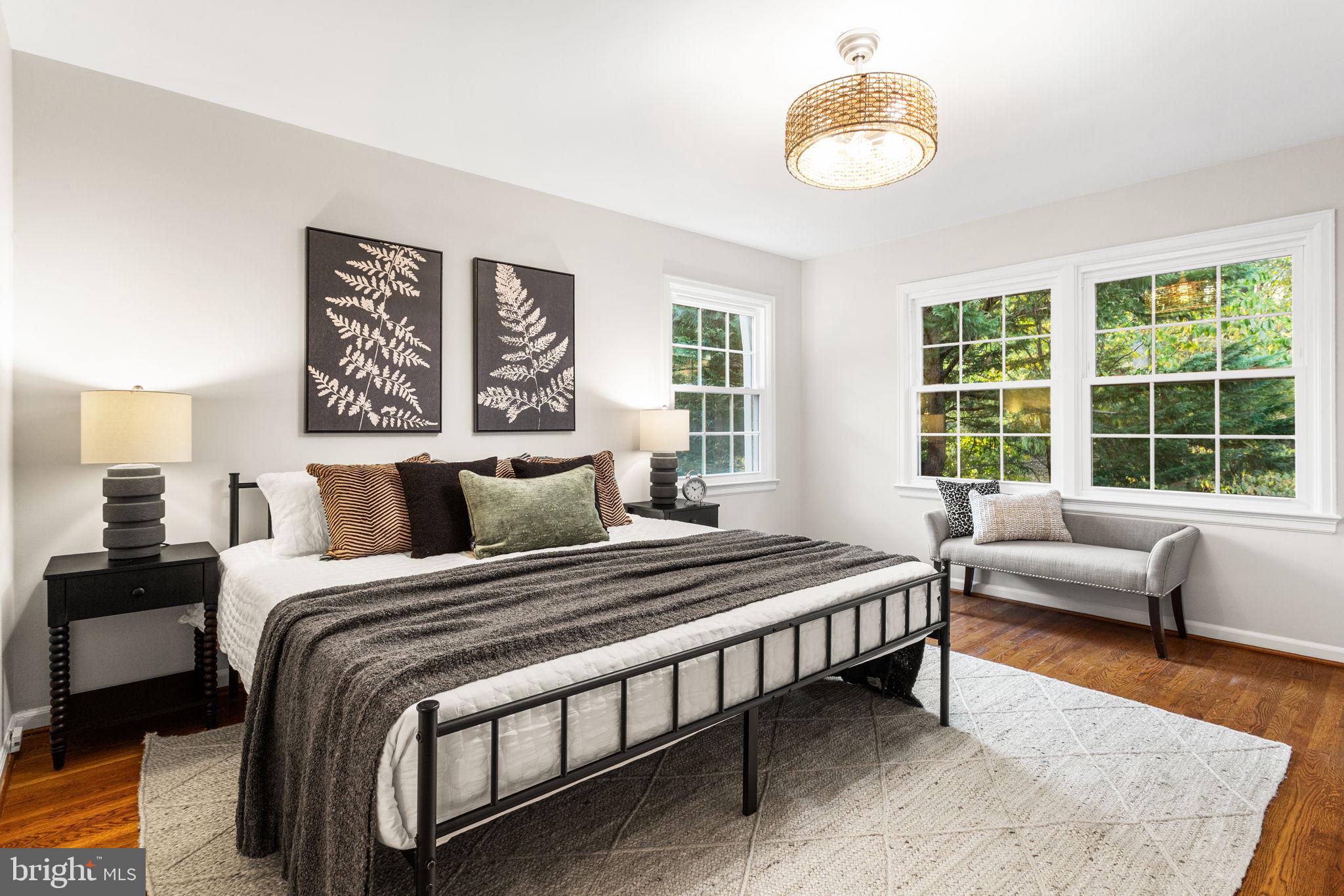 7404 Rippon Road Alexandria, VA 22307 - Photo 15 of 28 a bedroom with a bed and a couch