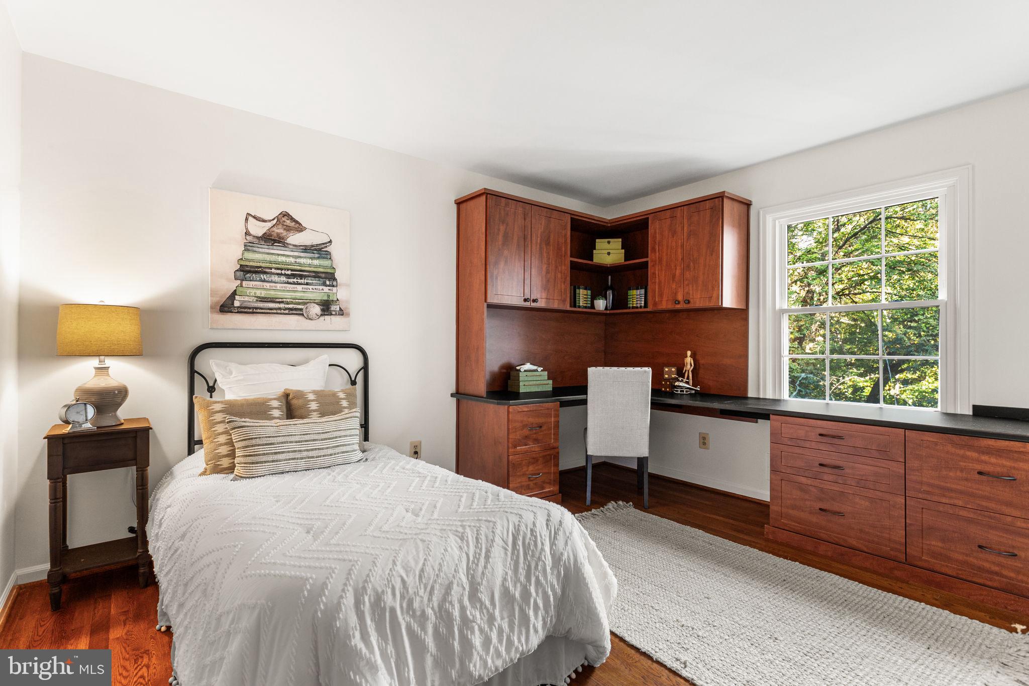 7404 Rippon Road Alexandria, VA 22307 - Photo 18 of 28 a bedroom with a bed and a window