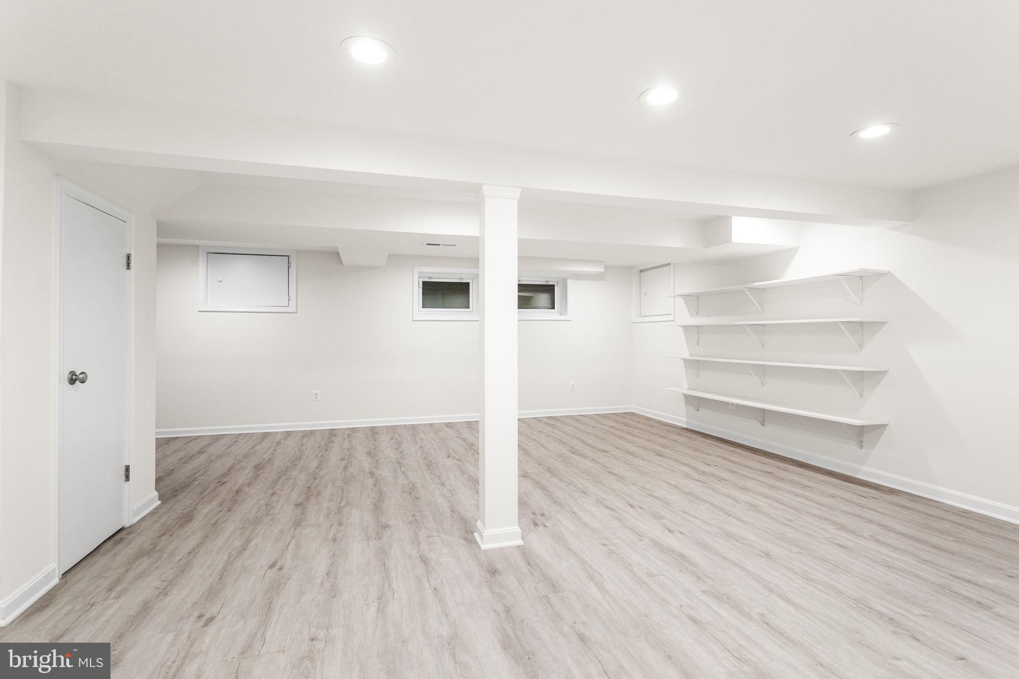 7404 Rippon Road Alexandria, VA 22307 - Photo 22 of 28 a view of empty room with wooden floor