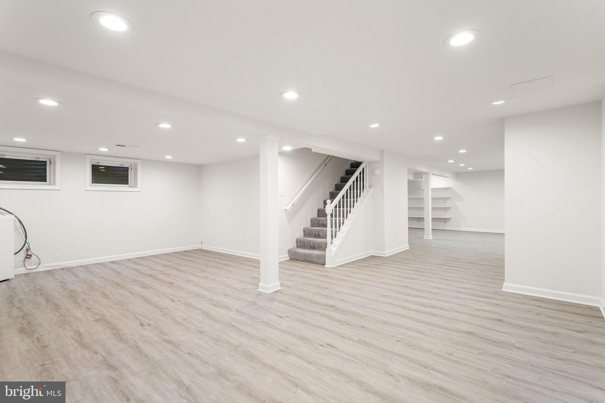 7404 Rippon Road Alexandria, VA 22307 - Photo 23 of 28 a view of an empty room with wooden floor