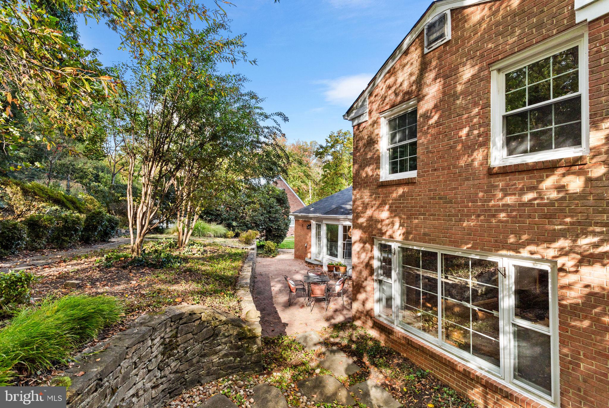 7404 Rippon Road Alexandria, VA 22307 - Photo 27 of 28 a view of a house with backyard and sitting area