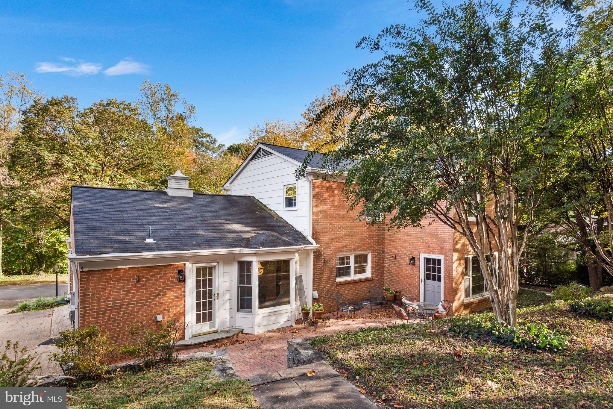 7404 Rippon Road Alexandria, VA 22307 - Photo 28 of 28 front view of a house with a tree