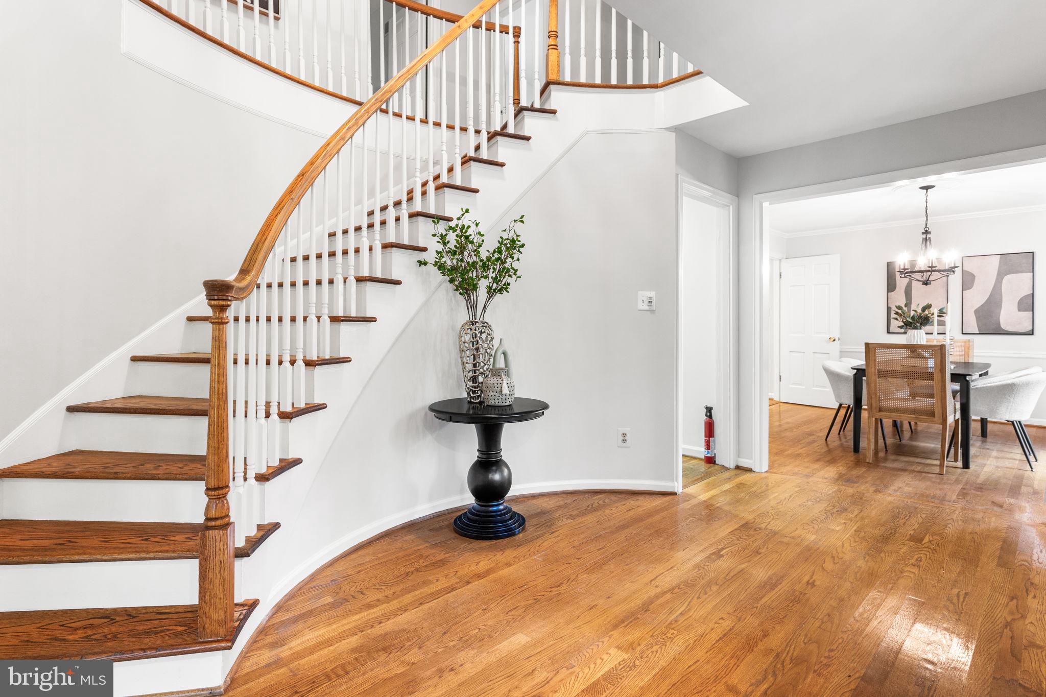 7404 Rippon Road Alexandria, VA 22307 - Photo 3 of 28 a view of entryway and hall with wooden floor