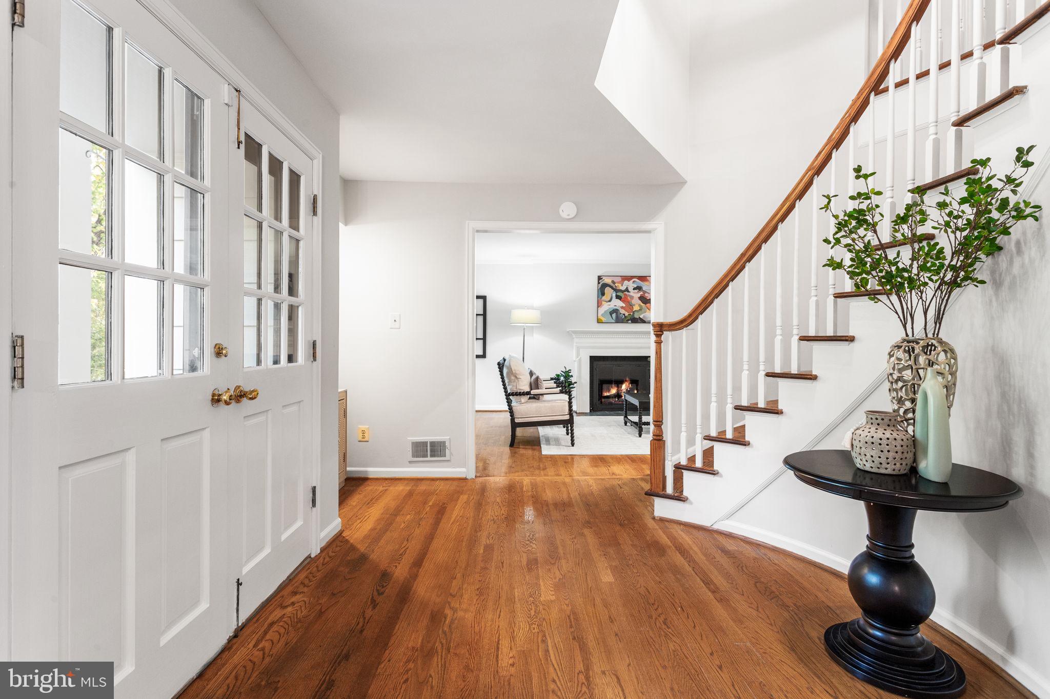 7404 Rippon Road Alexandria, VA 22307 - Photo 4 of 28 a view of entryway and hall with wooden floor