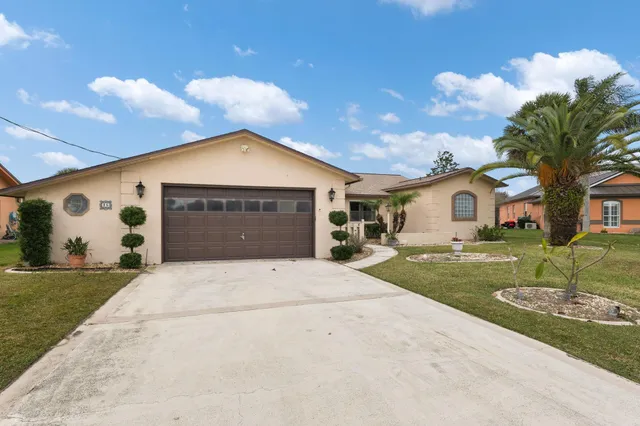 $560,000 | 25 Cottagegate Court, Palm Coast, FL 32137