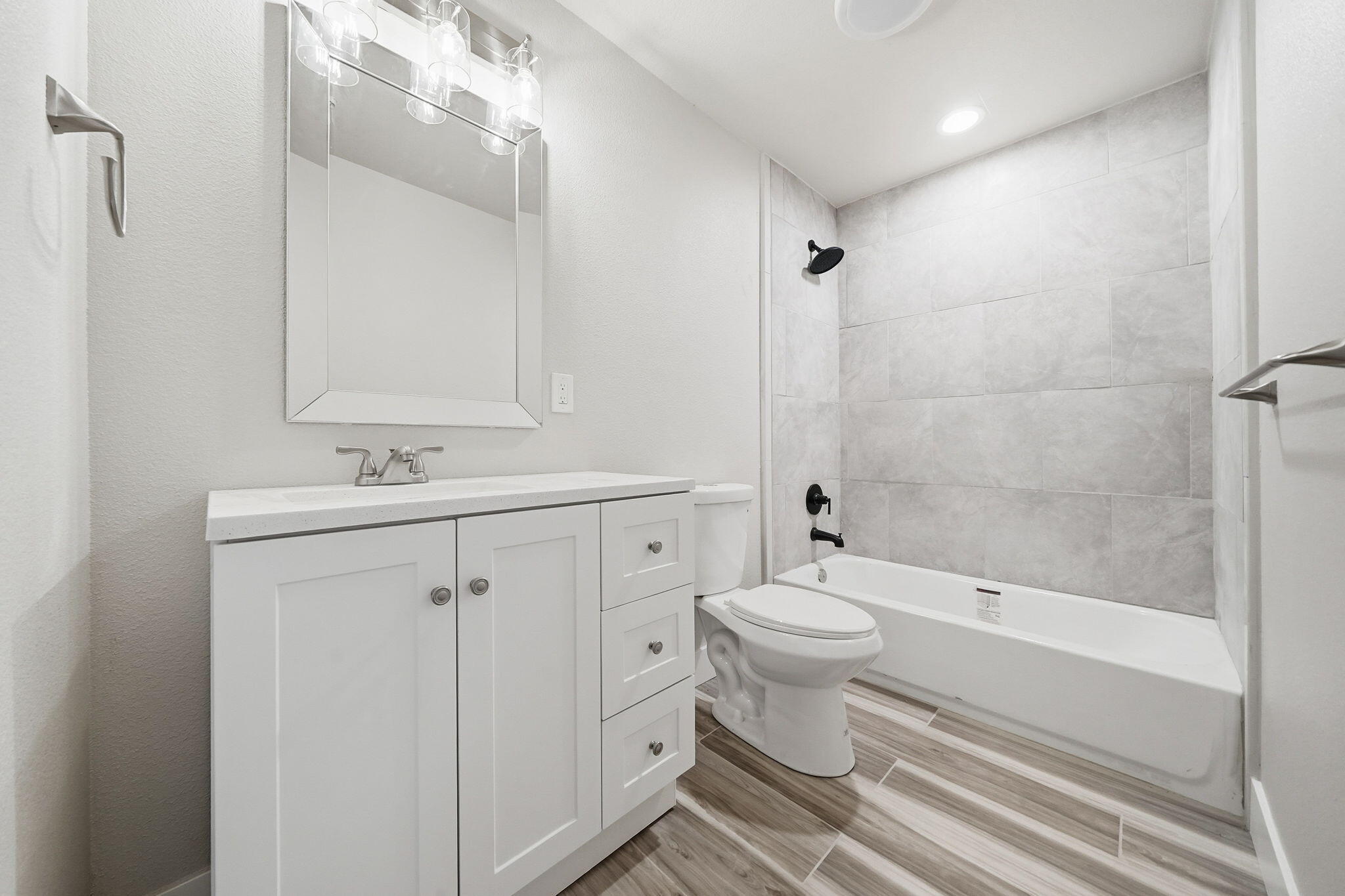 17014 Keswick Dam Road Redding, CA 96003 - Photo 16 of 61 a bathroom with a sink a toilet and a bathtub