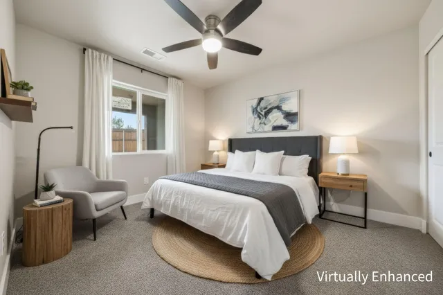 a white bath tub sitting next to a white toilet and sink