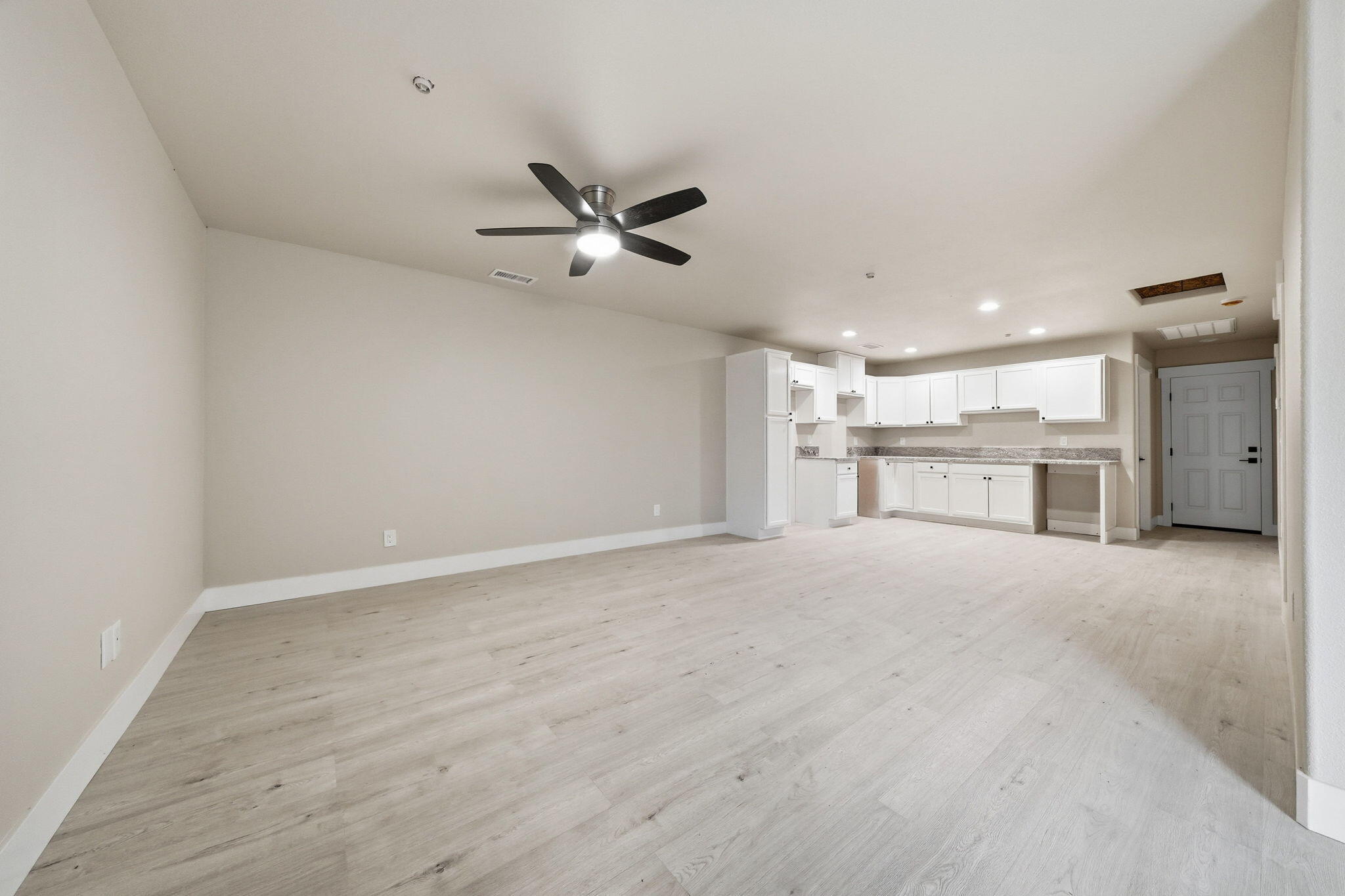 17014 Keswick Dam Road Redding, CA 96003 - Photo 28 of 61 a view of a kitchen with a sink and a refrigerator