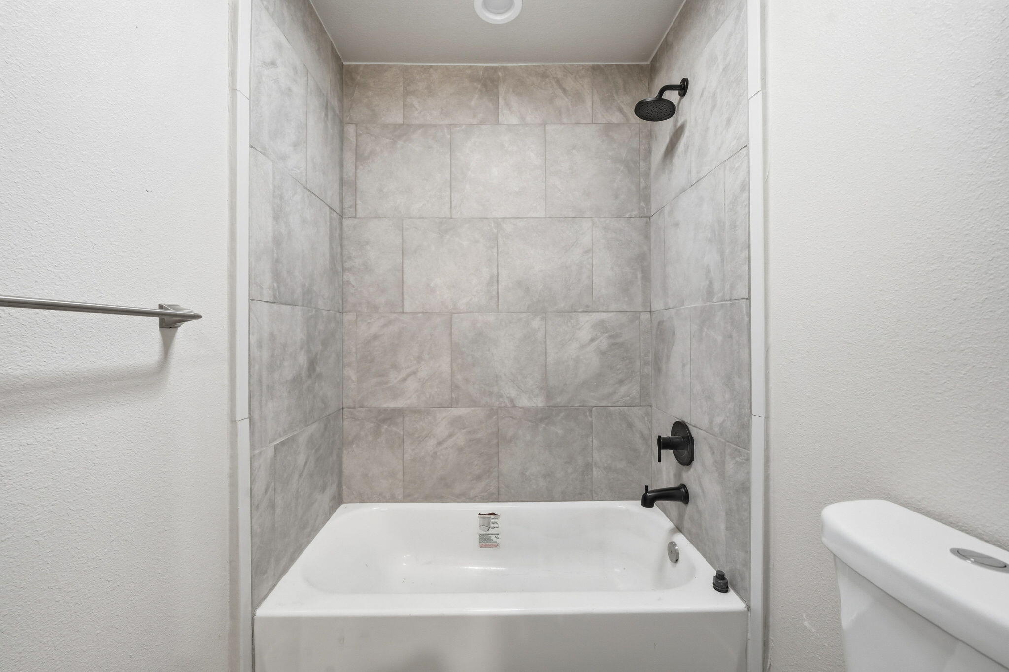 17014 Keswick Dam Road Redding, CA 96003 - Photo 35 of 61 a white bath tub sitting next to a white toilet and sink