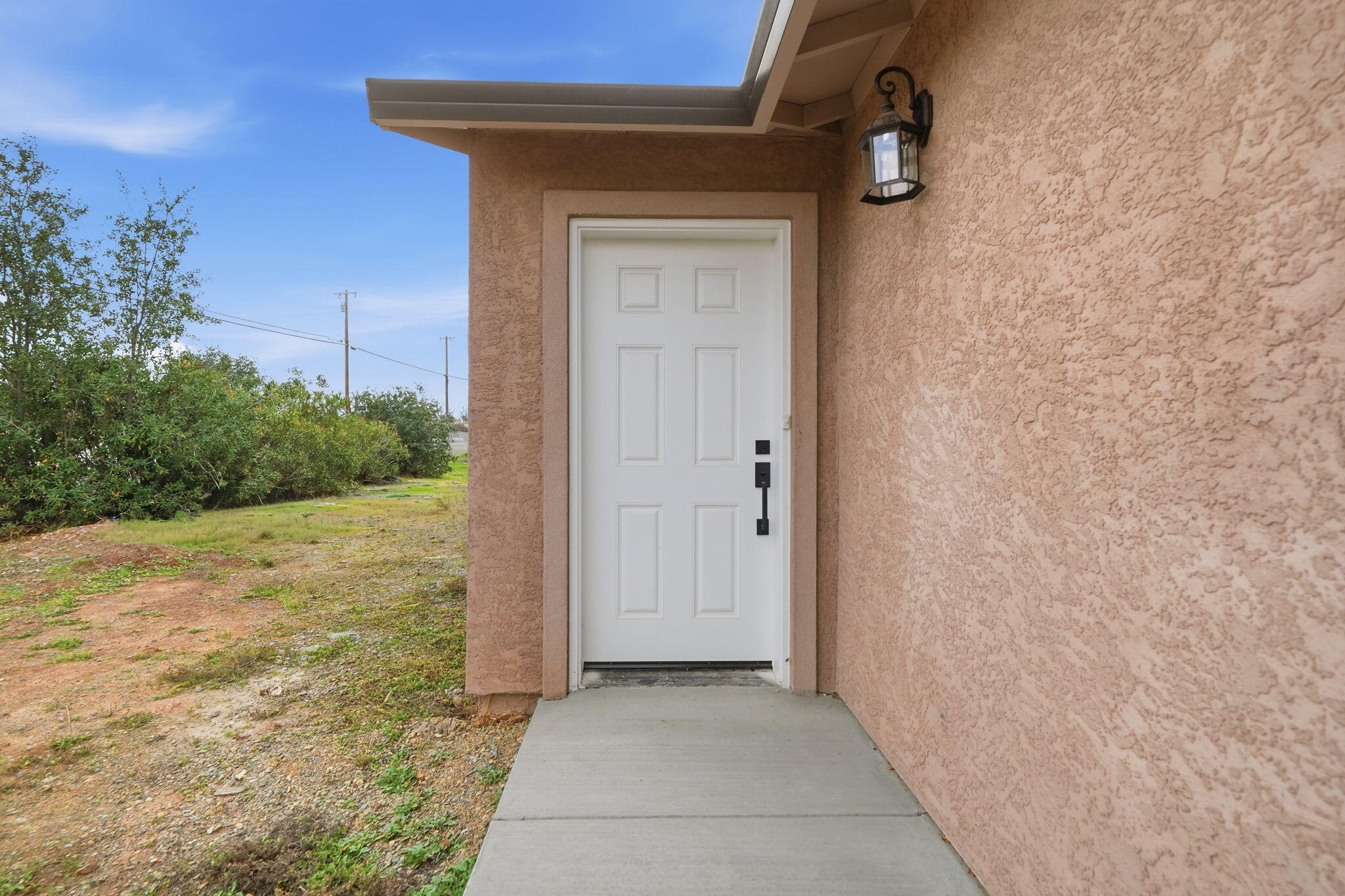 17014 Keswick Dam Road Redding, CA 96003 - Photo 7 of 61 a view of a house with a yard