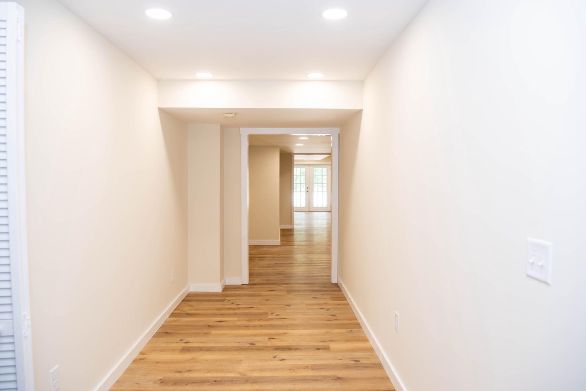 792 Forest Glen Road Moorefield, WV 26836 - Photo 92 of 146 Bright and inviting lower level hallway awaits you