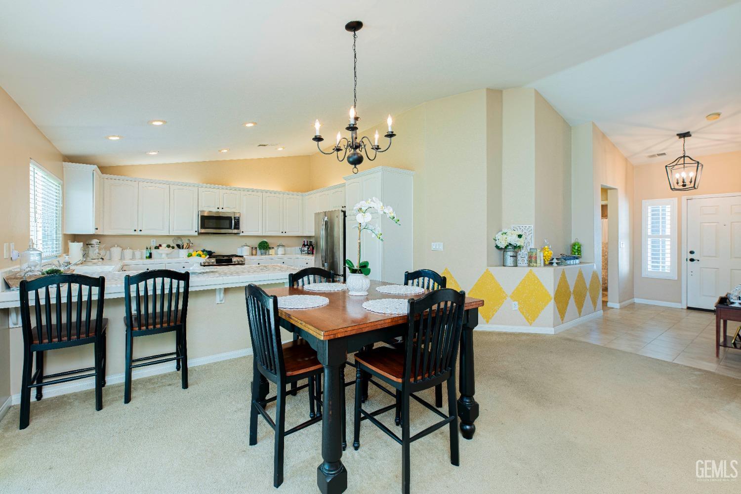Undisclosed Address Bakersfield, CA 93312 - Photo 13 of 41 a view of a dining room with furniture