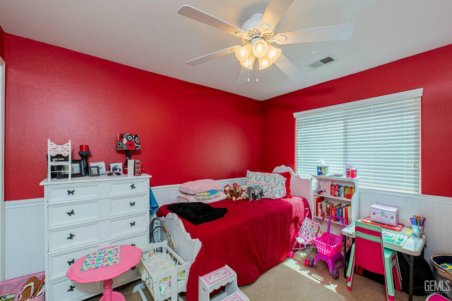 Undisclosed Address Bakersfield, CA 93312 - Photo 21 of 41 a bedroom with a bed and furniture