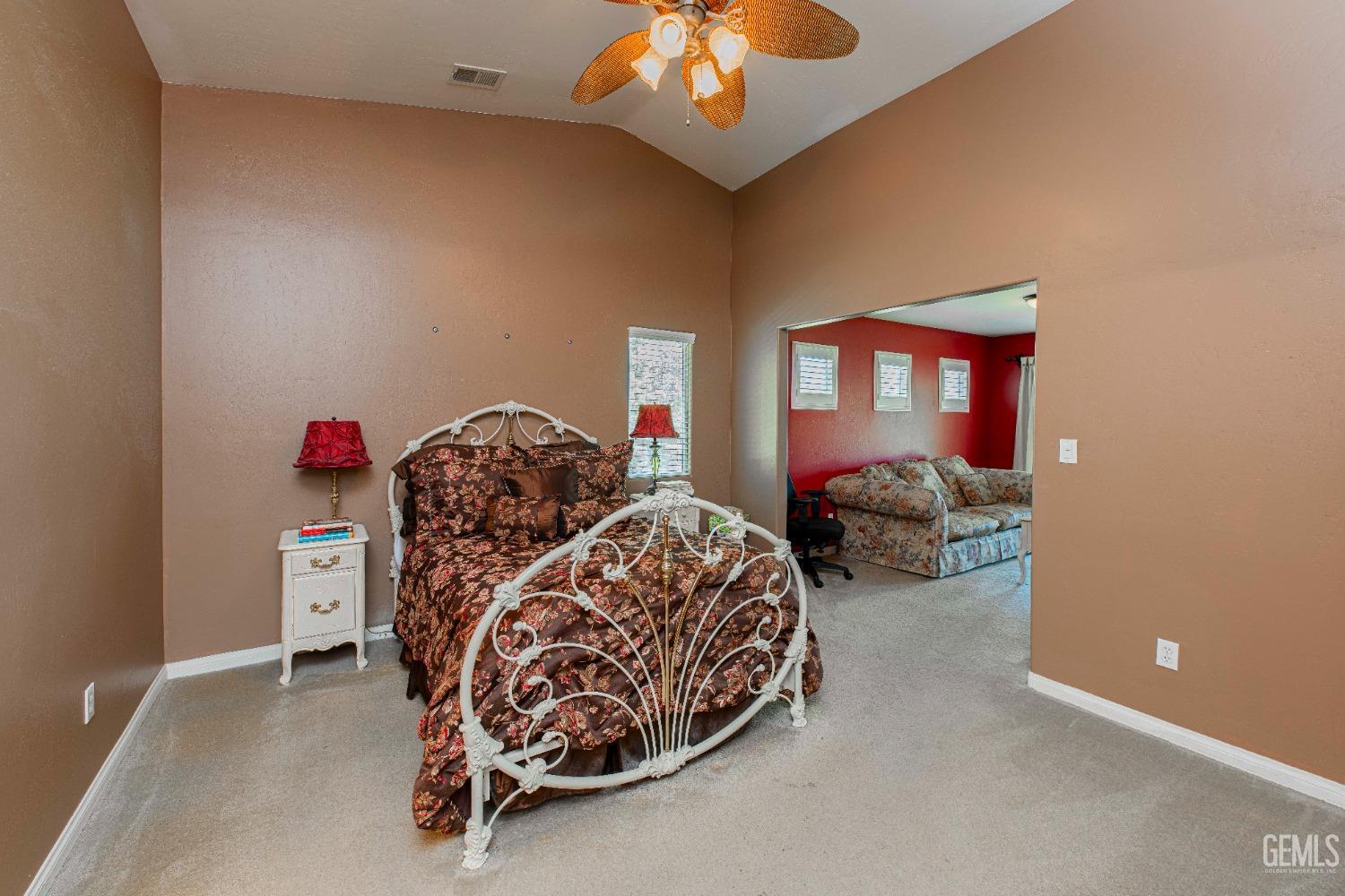 Undisclosed Address Bakersfield, CA 93312 - Photo 24 of 41 a bedroom with furniture and a chandelier
