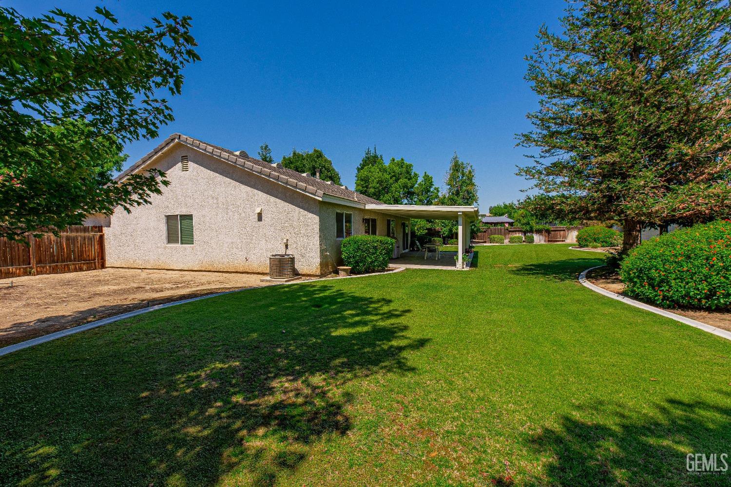 Undisclosed Address Bakersfield, CA 93312 - Photo 39 of 41 a view of house with backyard
