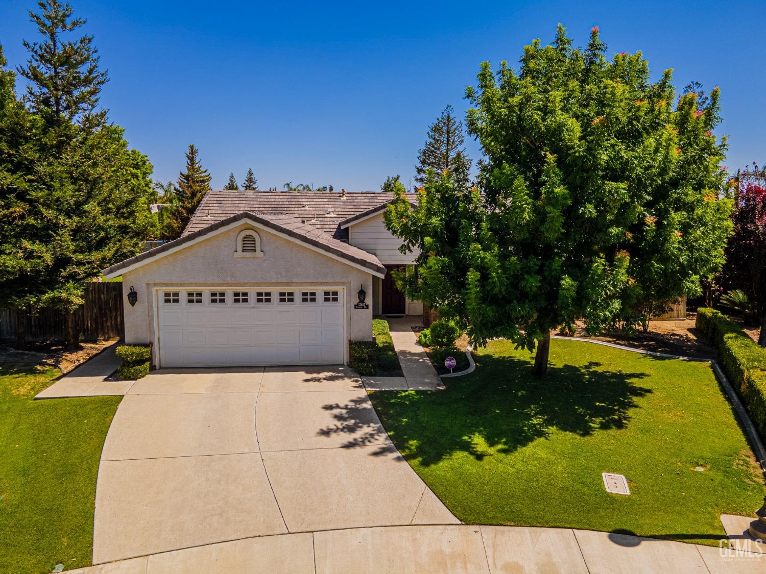 Undisclosed Address Bakersfield, CA 93312 - Photo 41 of 41 a view of a house with a yard