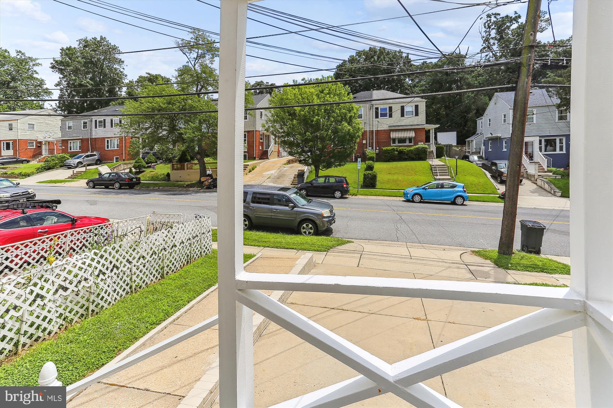 12016 Claridge Road Silver Spring, MD 20902 - Photo 3 of 35 a view of a swimming pool with a patio and a yard