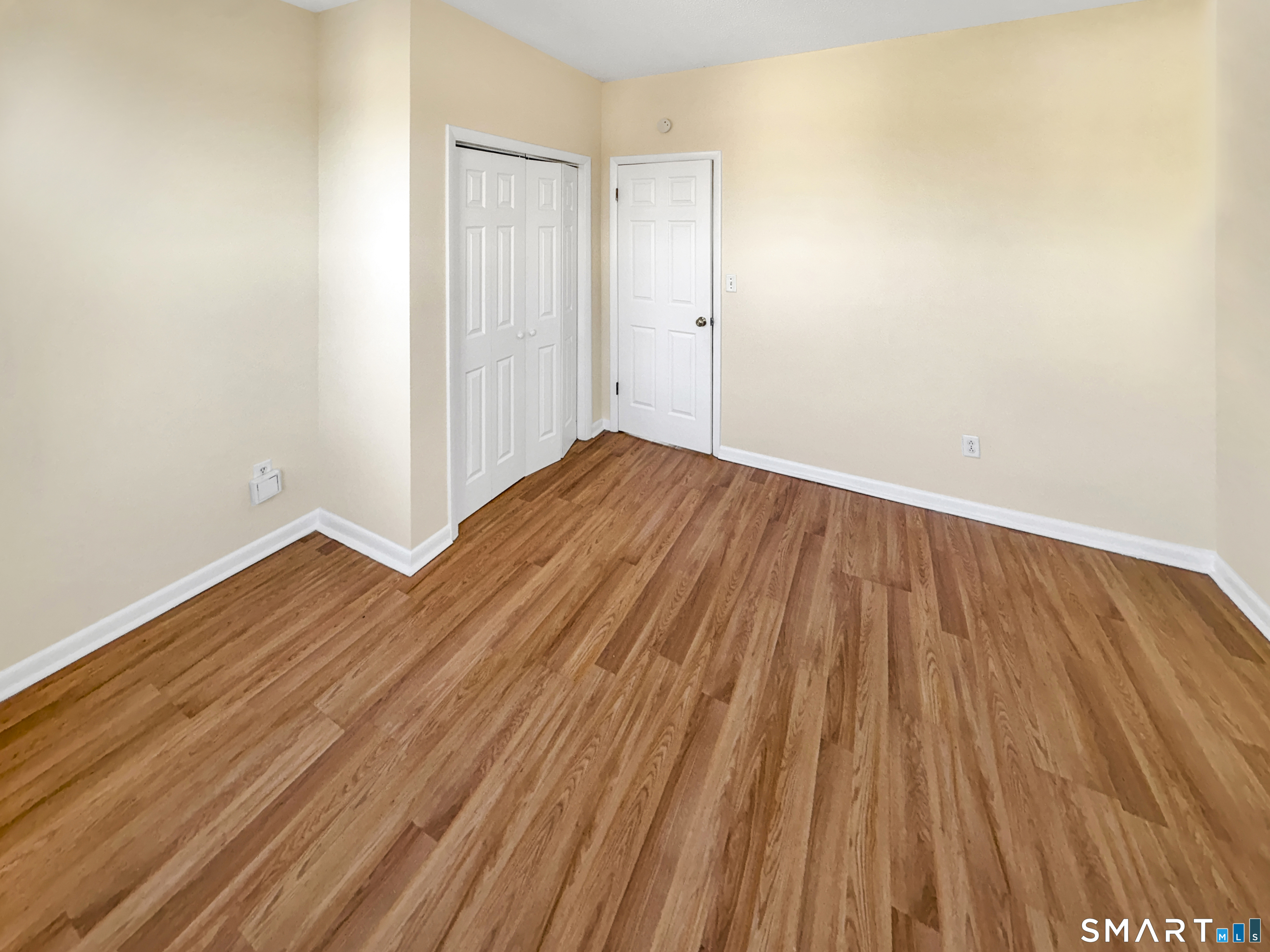 34 Wolcott Street, Unit 3 New Haven, CT 06513 - Photo 10 of 15 a view of wooden floor in a room
