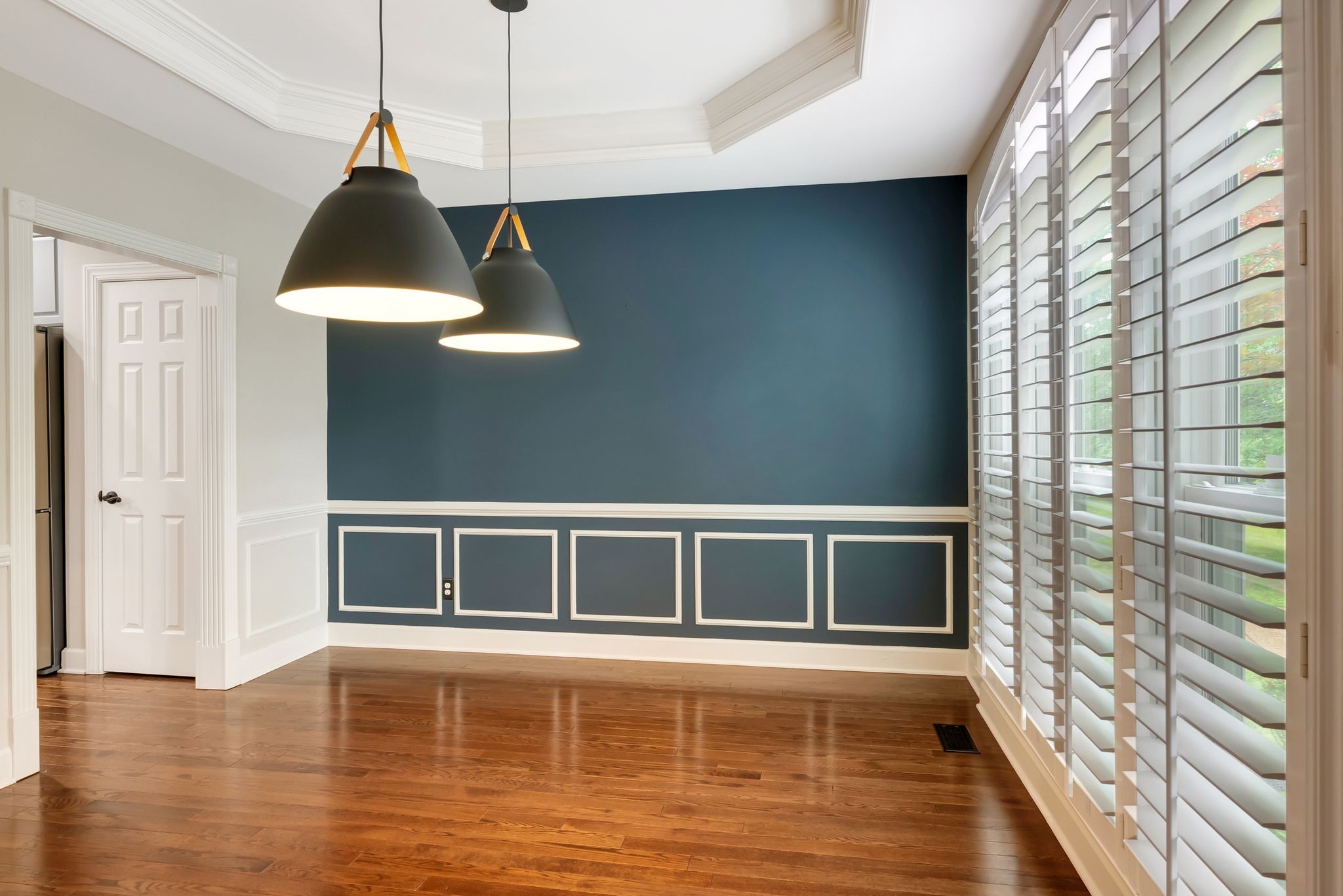 106 Ashton Park Boulevard Franklin, TN 37067 - Photo 16 of 64 a view of an empty room with wooden floor and a window