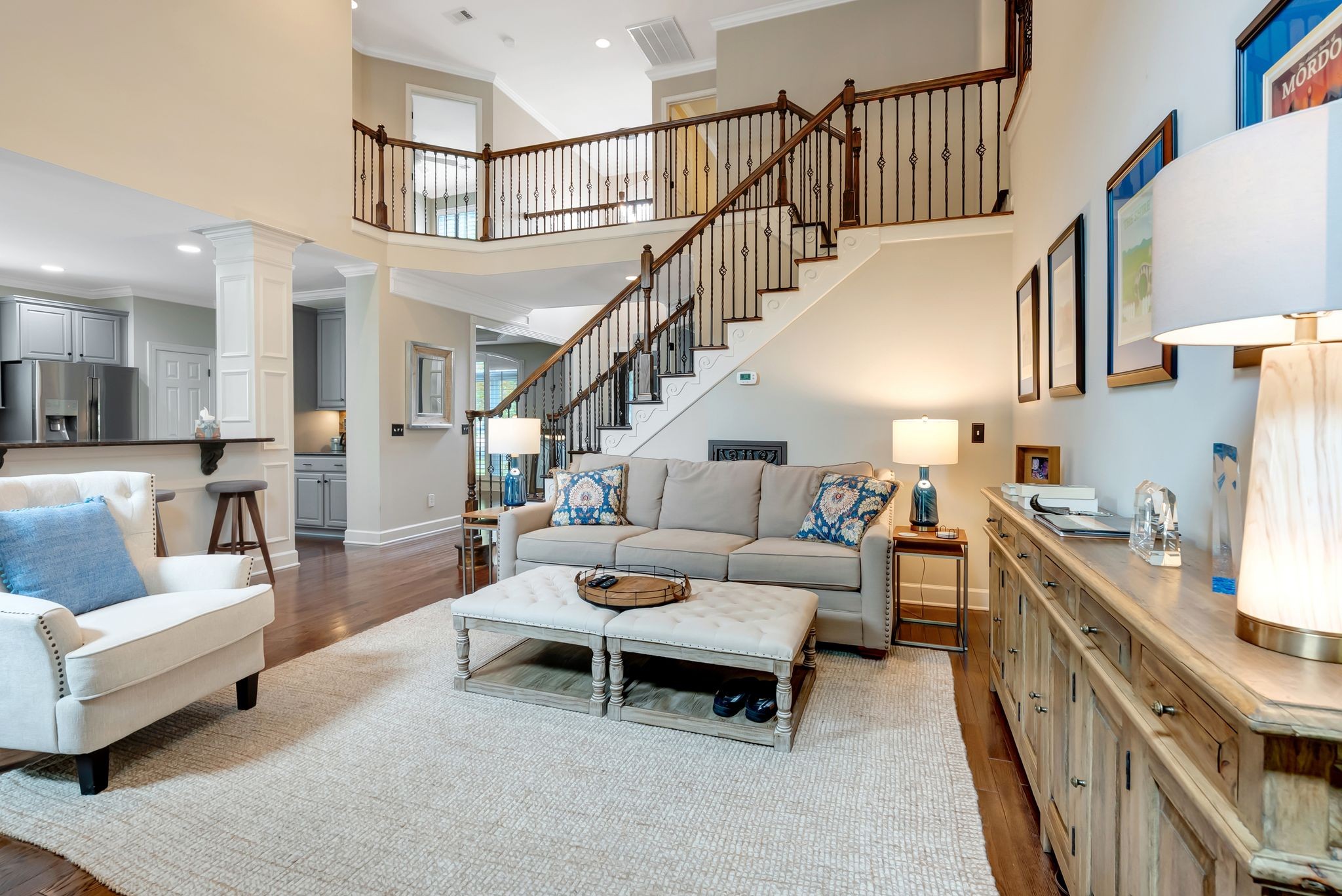 106 Ashton Park Boulevard Franklin, TN 37067 - Photo 21 of 64 a living room with furniture and a wooden floor