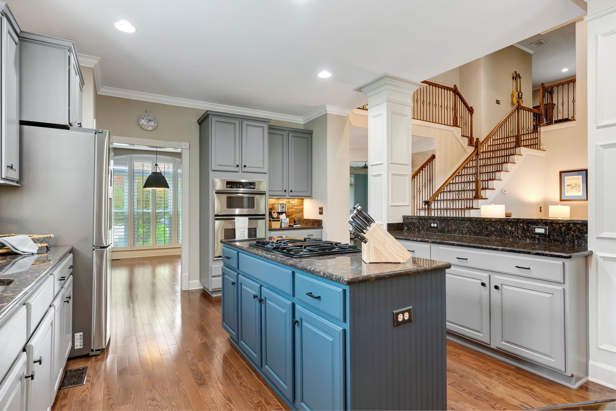 106 Ashton Park Boulevard Franklin, TN 37067 - Photo 27 of 64 a kitchen with stainless steel appliances granite countertop a sink stove and refrigerator